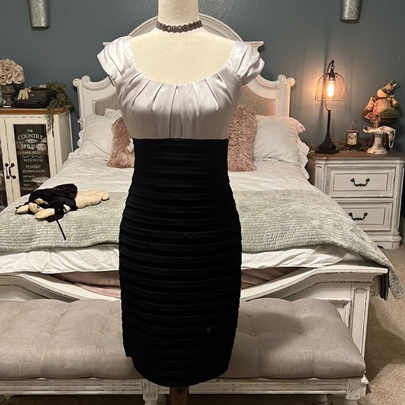 London Times Dresses & Skirts - Black/silver fitted size 4 dress.  Very flattering to the figure!